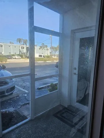 a view of street with parked cars