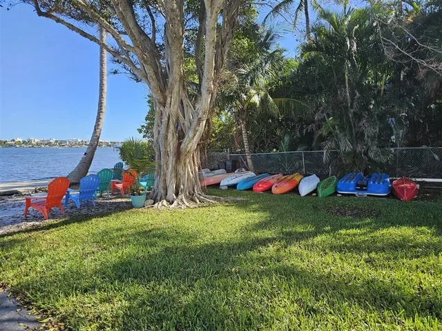 a view of a lake with a building in the background
