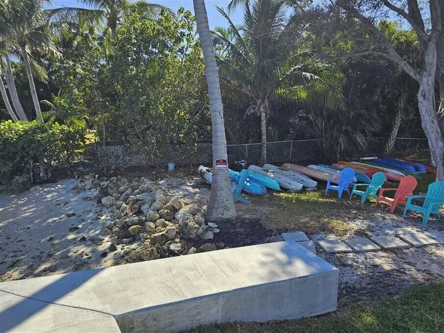 a view of outdoor space with garden and seating area