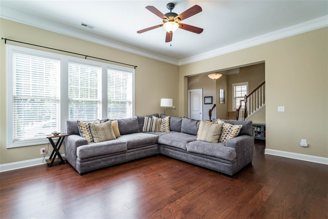 1411 Van Page Boulevard Raleigh, NC 27607 - Photo 7 of 26 Large, living room tucked near the foyer opens you into this spacious layout! Living Room