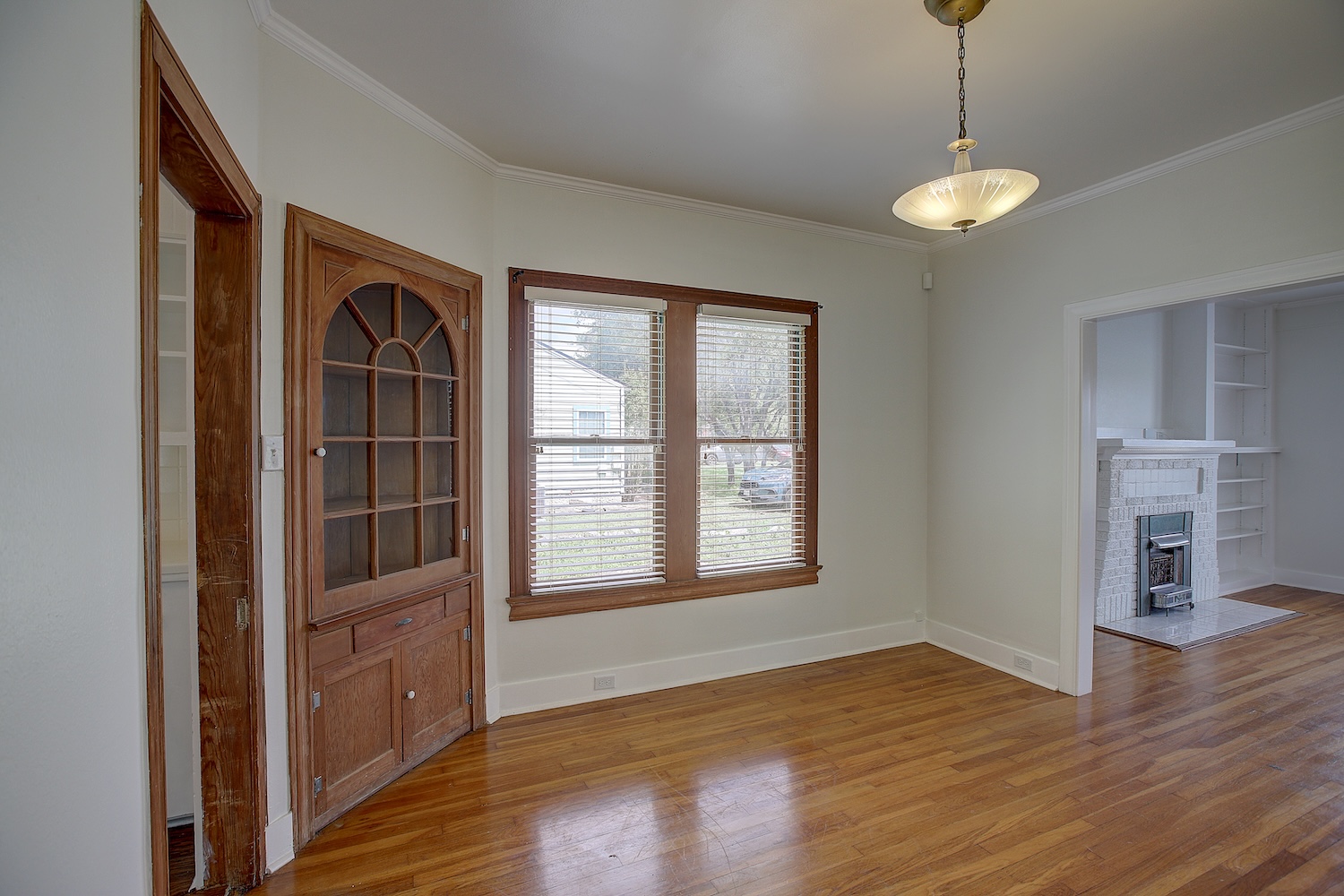 1708 Olive Street Georgetown, TX 78626 - Photo 7 of 40 a view of empty room with wooden floor and fan