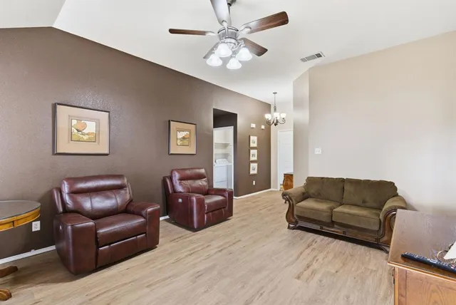 a living room with furniture and a couch