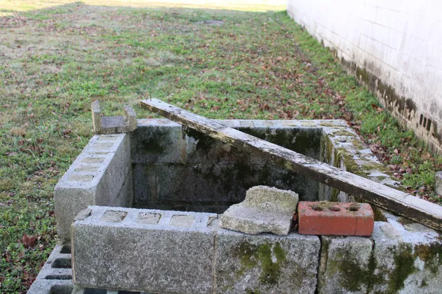 a terrace view with two chairs and a table