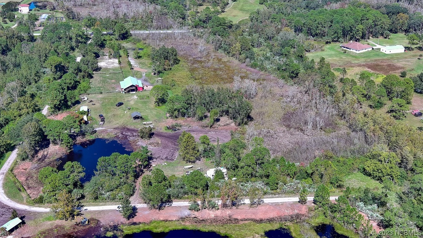 806 West Ariel Road Edgewater, FL 32141 - Photo 13 of 15 an aerial view of house with outdoor space