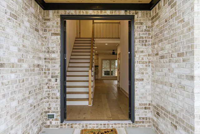 a kitchen with a sink a counter and a window