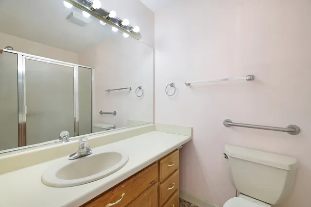 a view of a porch with wooden floor