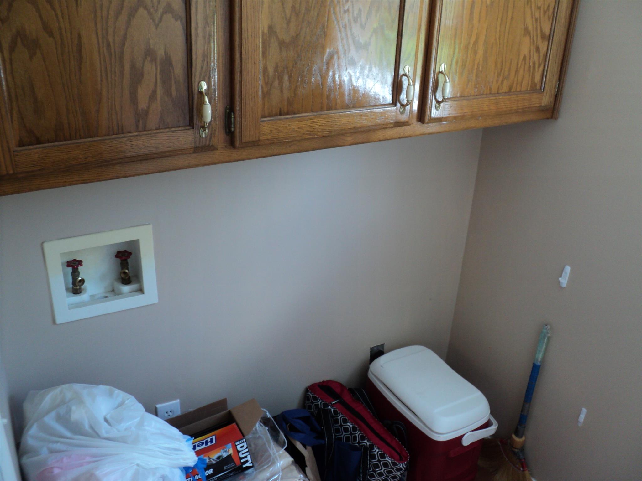 1135 Nancy Green Ridge Road Prospect, TN 38477 - Photo 10 of 20 Laundry room w/ solid oak cabinets.
