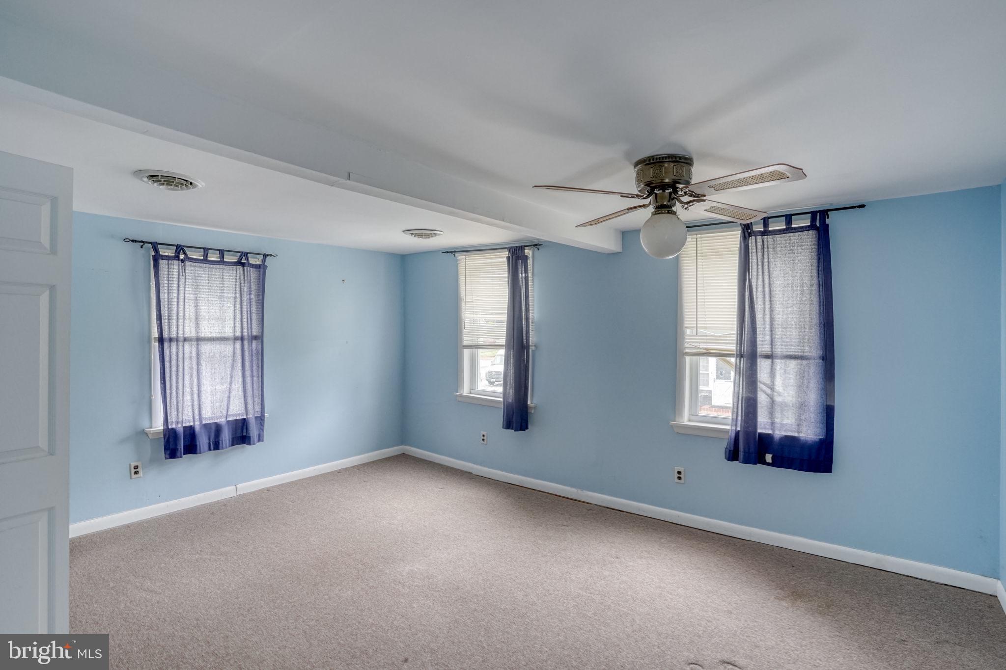 257 Front Street Leipsic, DE 19901 - Photo 24 of 37 wooden floor in an empty room with a window
