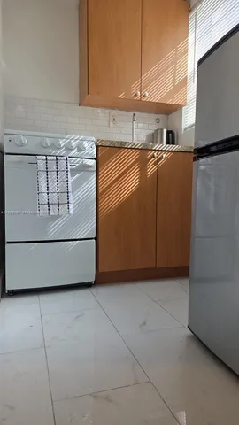 a utility room with washer and dryer