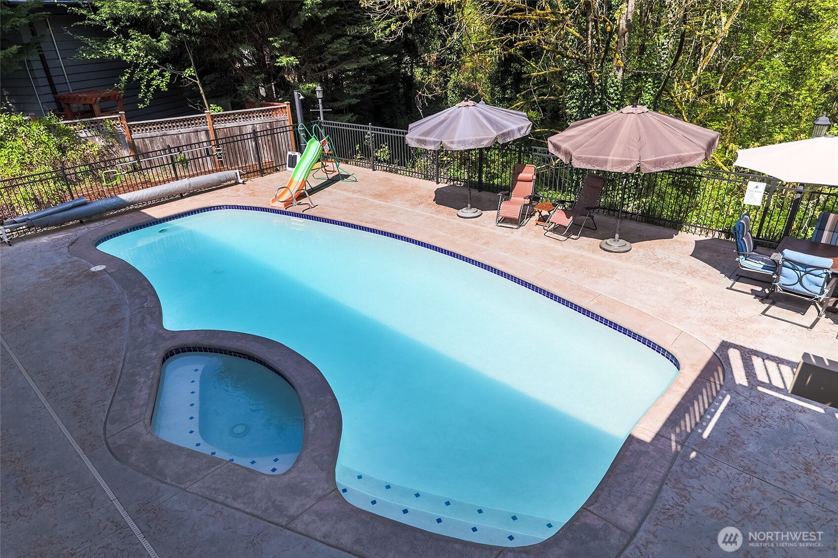 18009 Bellflower Road Bothell, WA 98012 - Photo 13 of 40 swimming pool view with a seating space