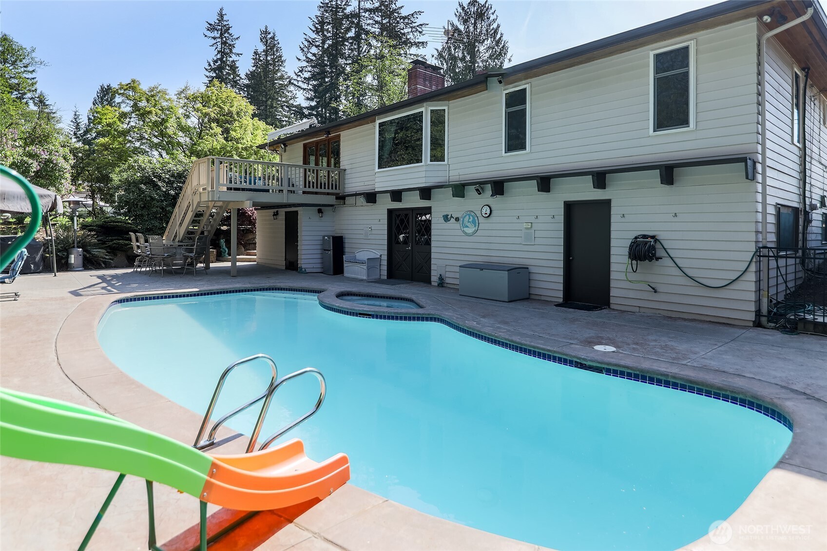 18009 Bellflower Road Bothell, WA 98012 - Photo 2 of 40 a front view of a house with patio