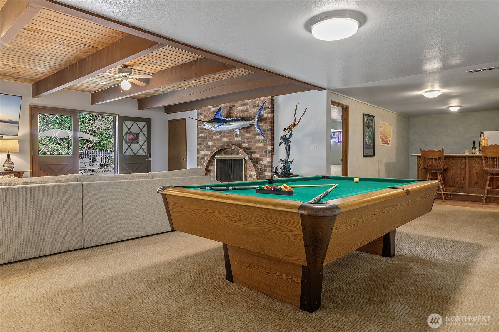 18009 Bellflower Road Bothell, WA 98012 - Photo 27 of 40 a room with pool table and windows