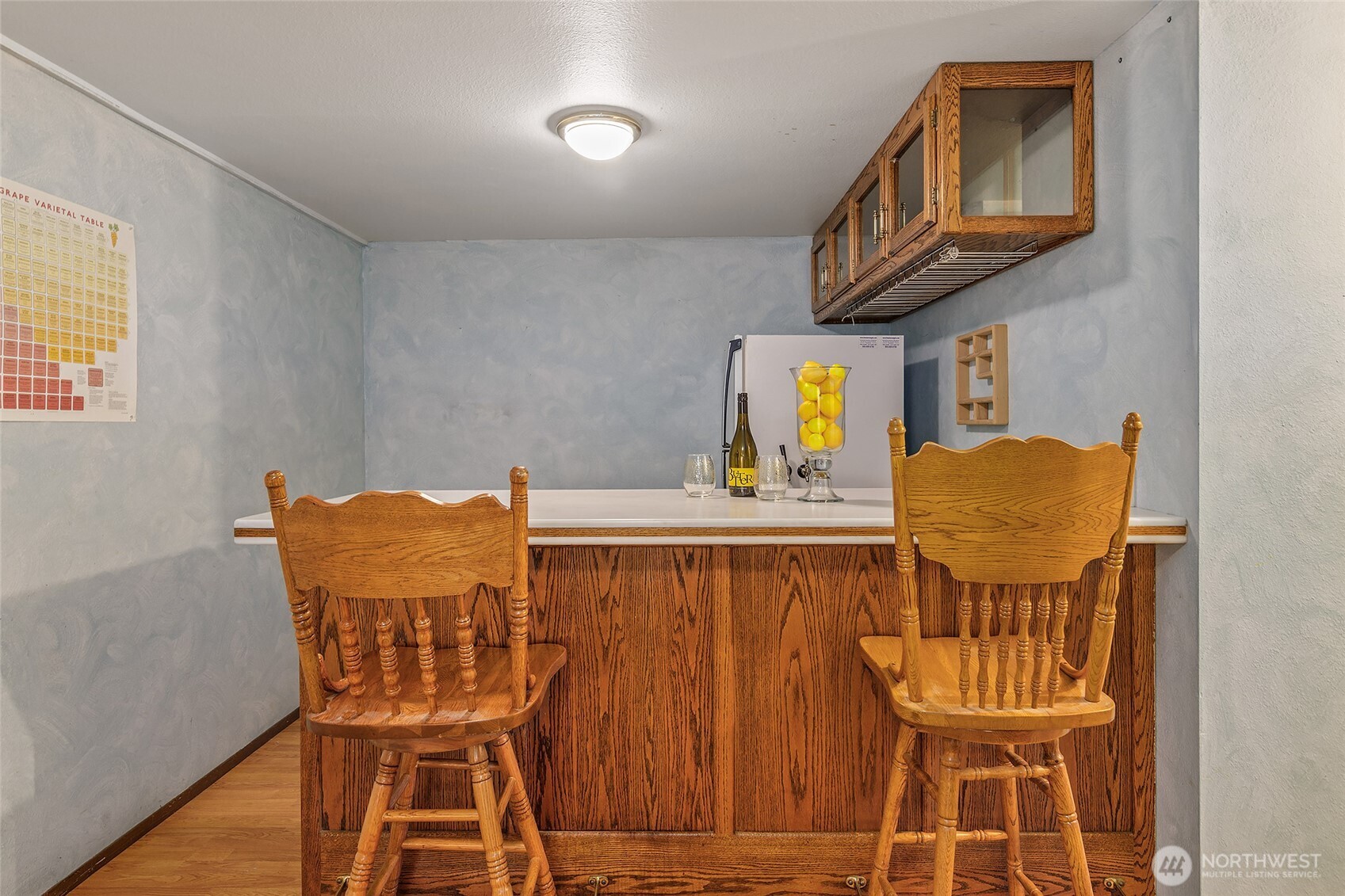 18009 Bellflower Road Bothell, WA 98012 - Photo 30 of 40 a dining room with furniture and a window