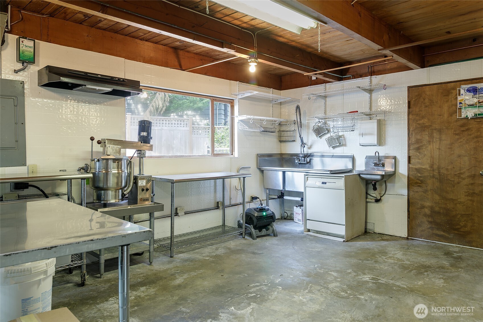 18009 Bellflower Road Bothell, WA 98012 - Photo 35 of 40 a utility room with cabinets