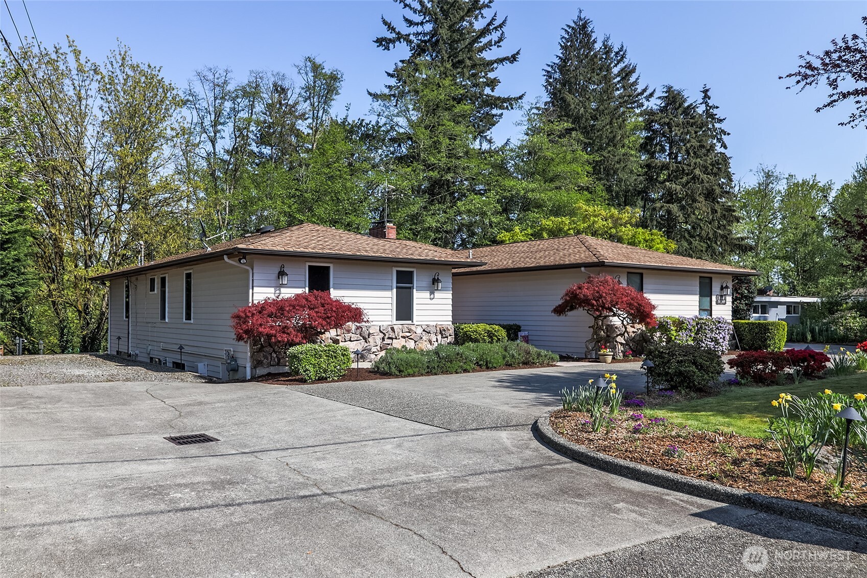18009 Bellflower Road Bothell, WA 98012 - Photo 39 of 40 front view of a house with a yard