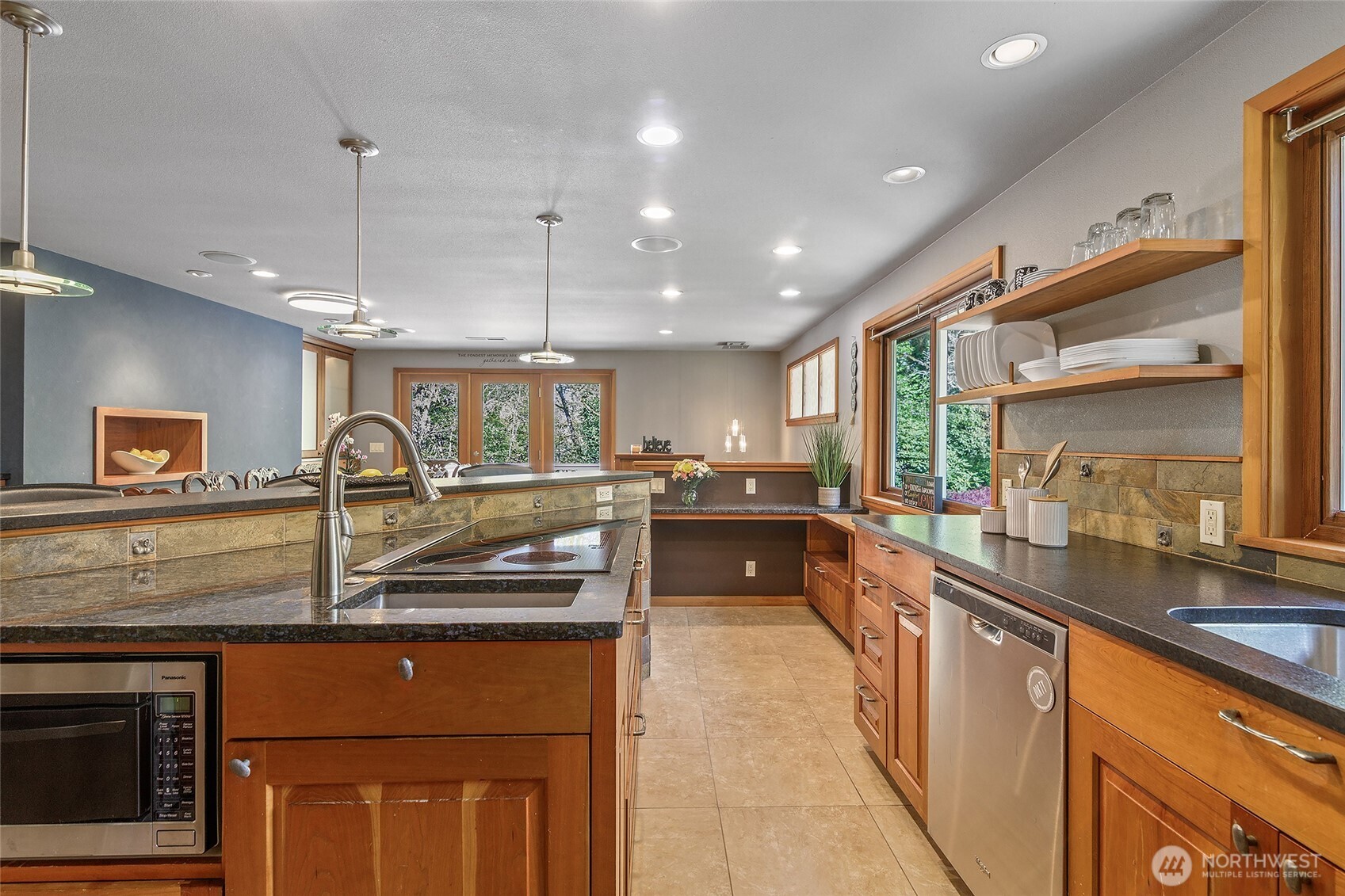 18009 Bellflower Road Bothell, WA 98012 - Photo 7 of 40 a kitchen with lots of counter space and a sink