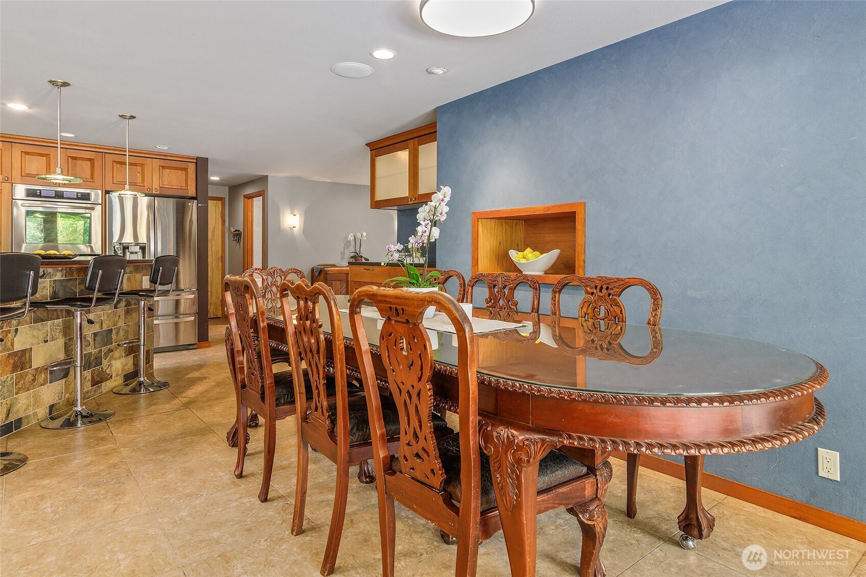 18009 Bellflower Road Bothell, WA 98012 - Photo 8 of 40 a view of a dining room with furniture