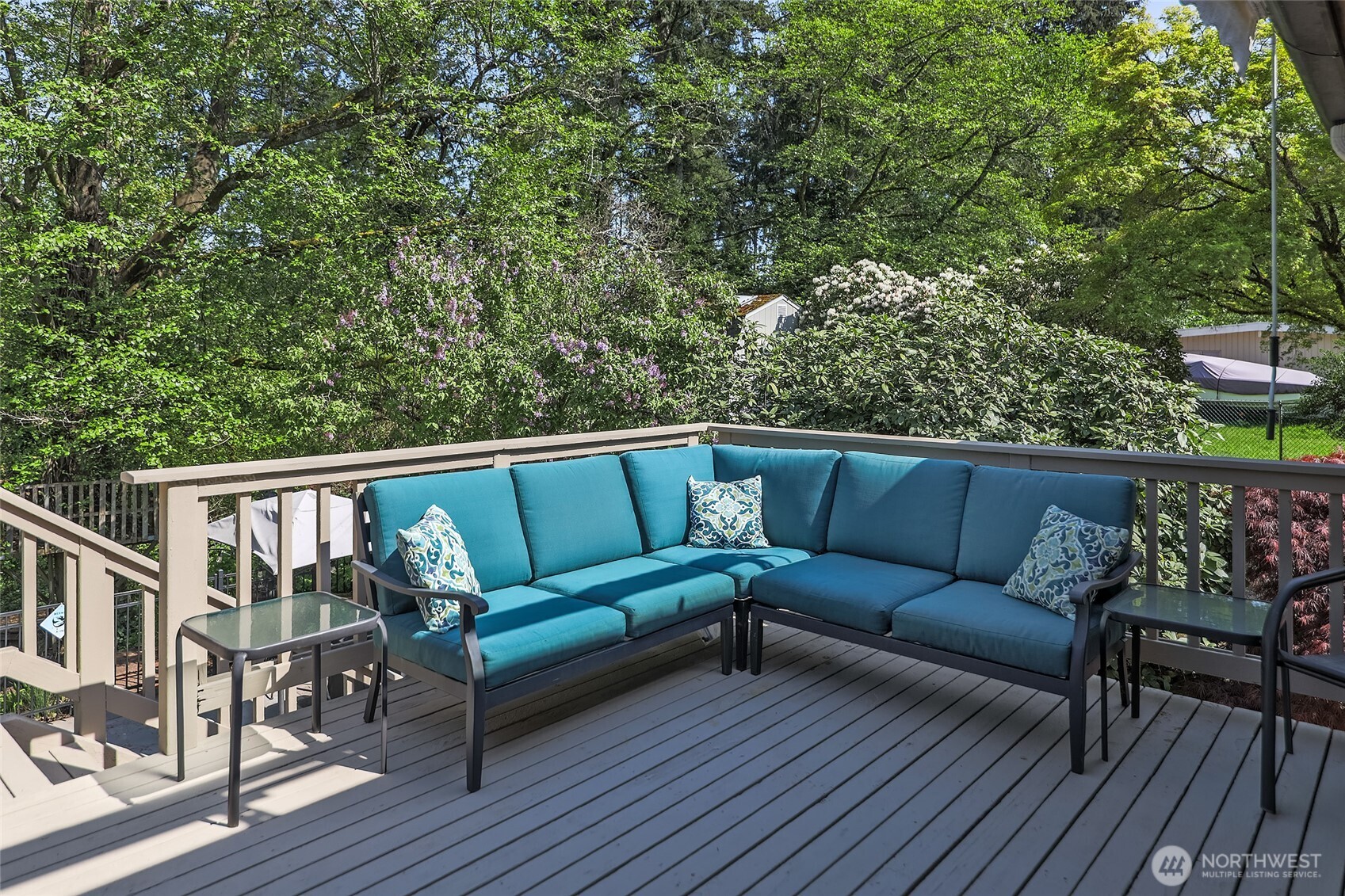 18009 Bellflower Road Bothell, WA 98012 - Photo 10 of 40 a view of a couches in a balcony