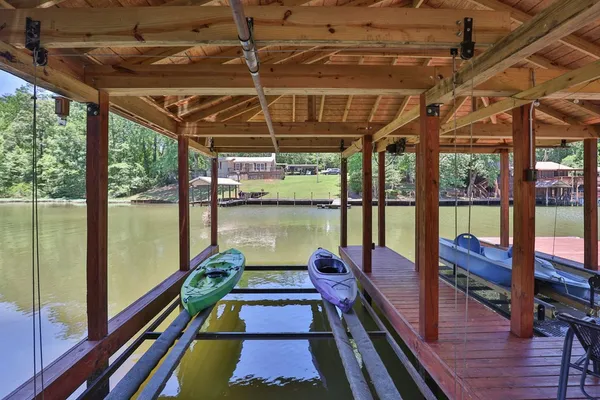 a view of a balcony with wooden floor
