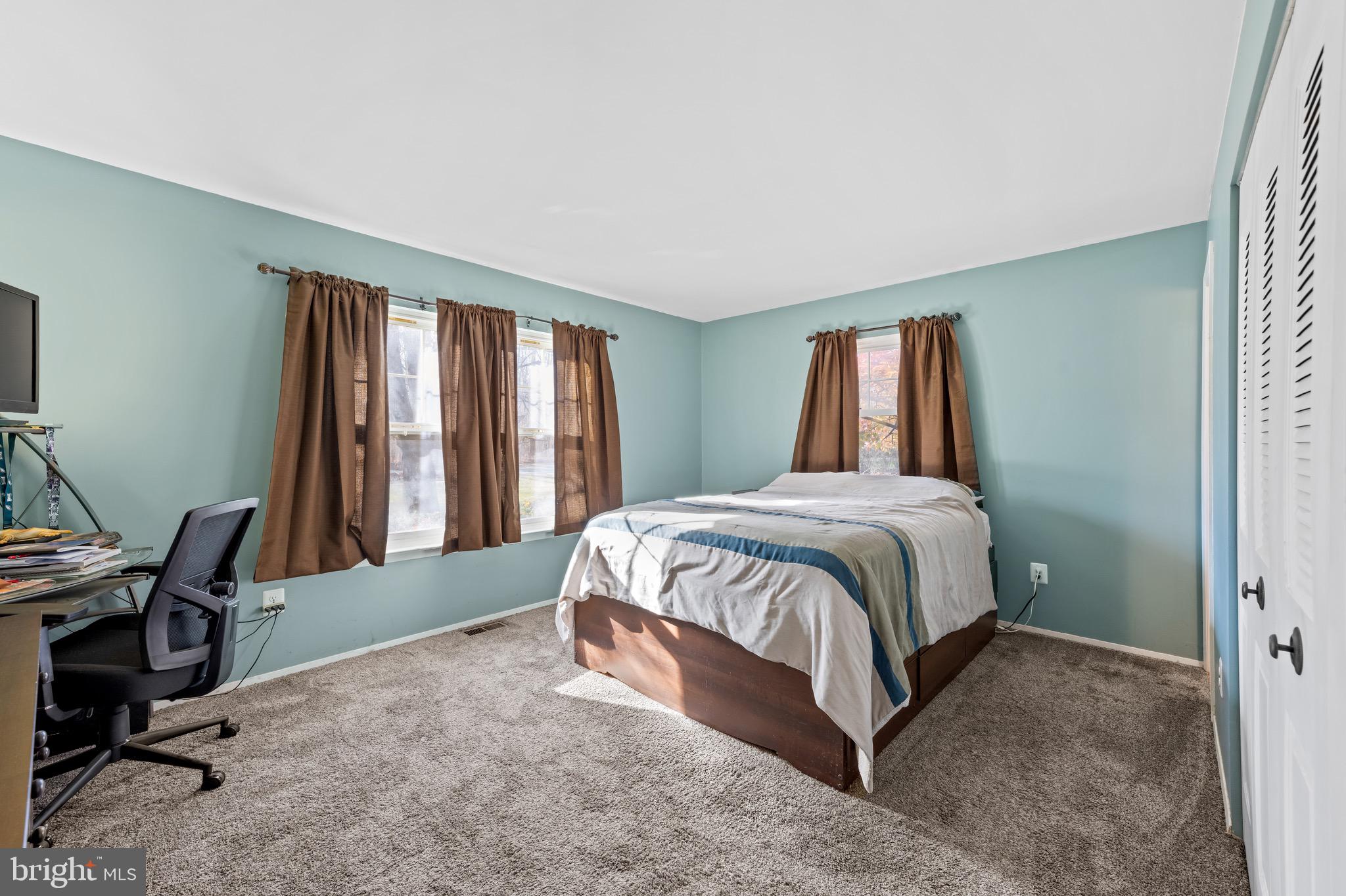 284 Radix Road Williamstown, NJ 08094 - Photo 14 of 30 a bed sitting in a room next to a window