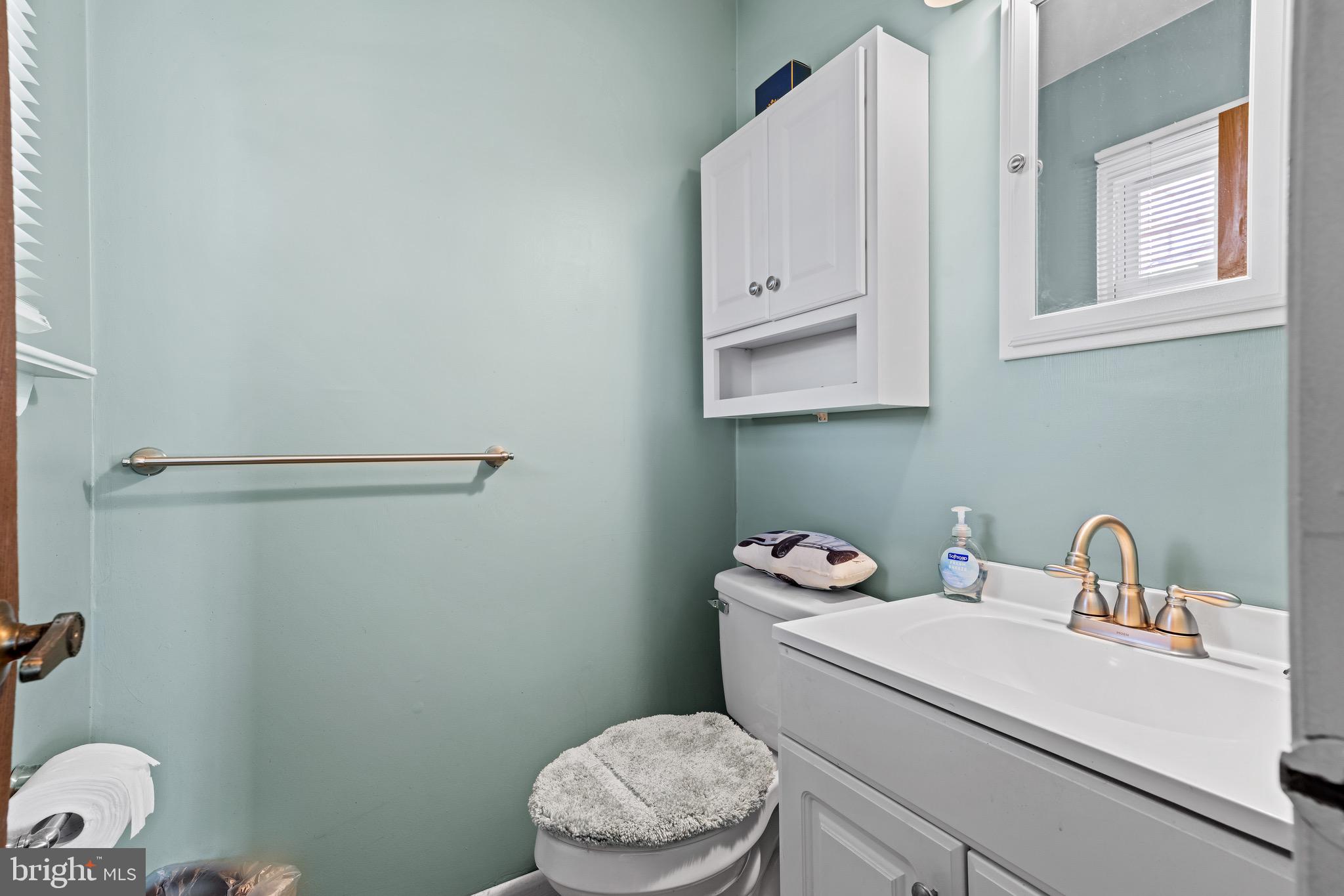 284 Radix Road Williamstown, NJ 08094 - Photo 16 of 30 a bathroom with a sink a toilet and vanity