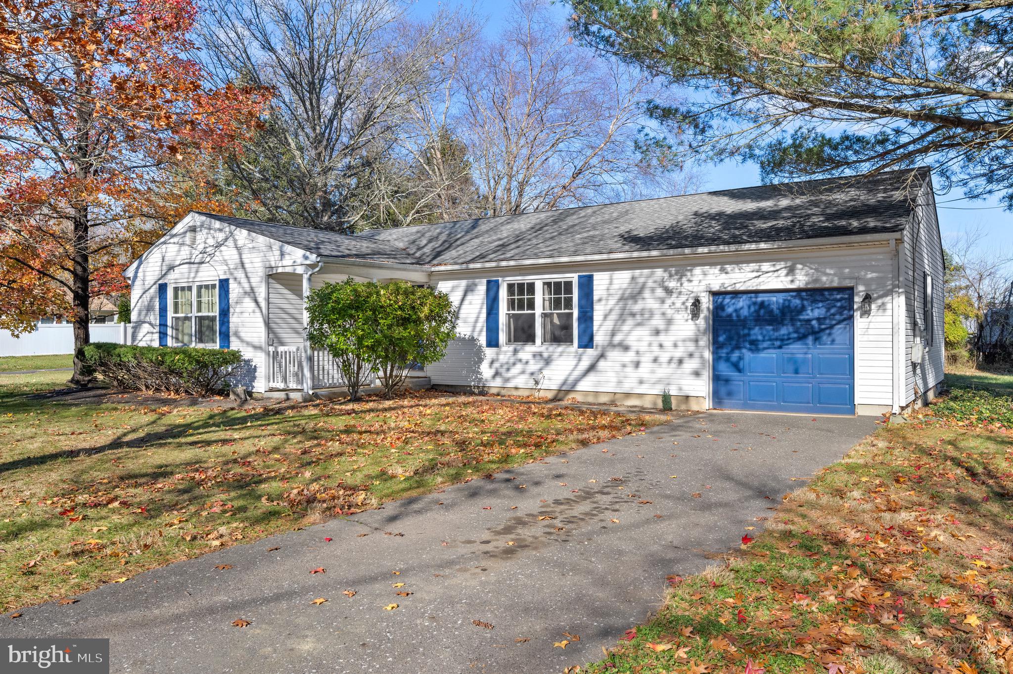 284 Radix Road Williamstown, NJ 08094 - Photo 2 of 30 a front view of a house with a yard and garage