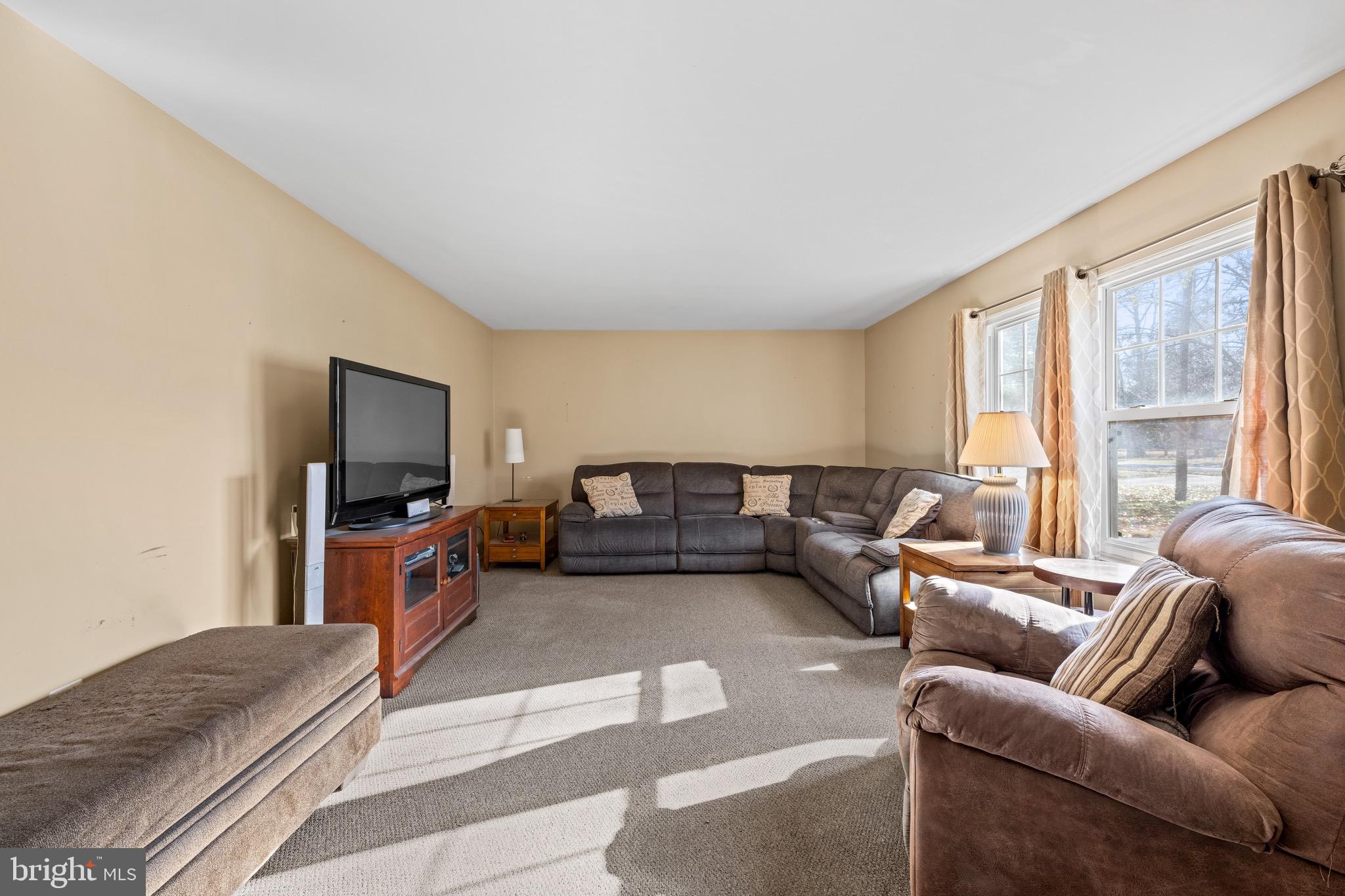 284 Radix Road Williamstown, NJ 08094 - Photo 5 of 30 a living room with furniture and a flat screen tv