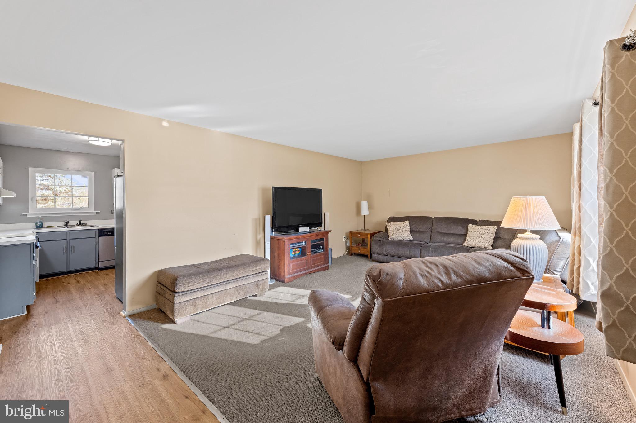 284 Radix Road Williamstown, NJ 08094 - Photo 7 of 30 a bedroom with a bed and a couch