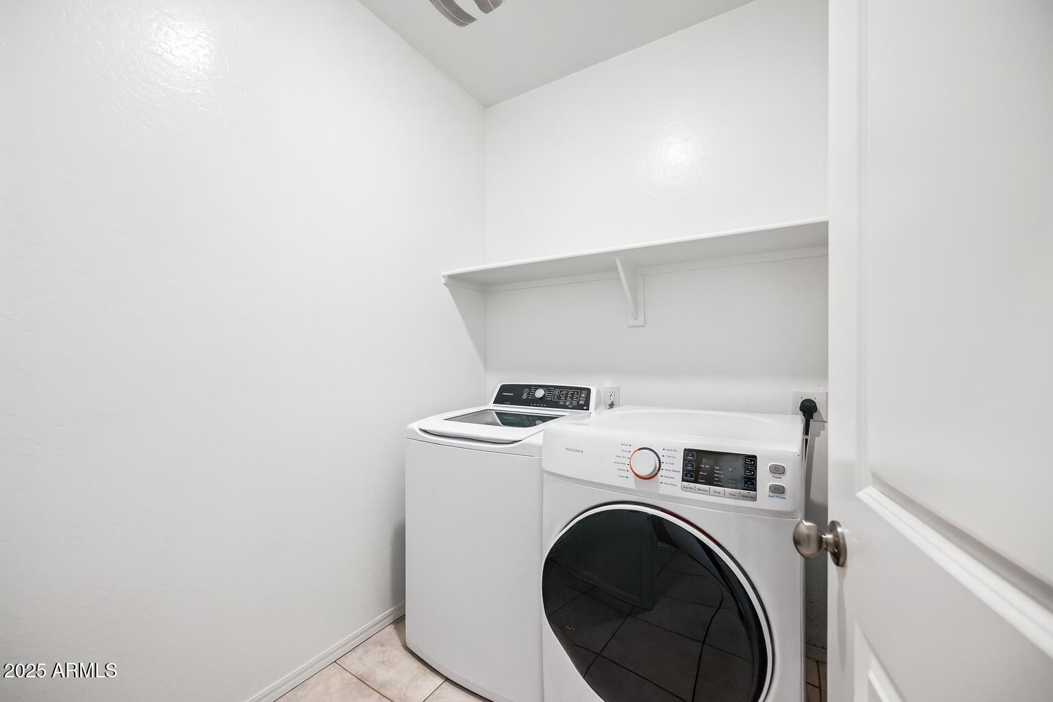 25626 West Coles Road Buckeye, AZ 85326 - Photo 17 of 31 a utility room with dryer and washer