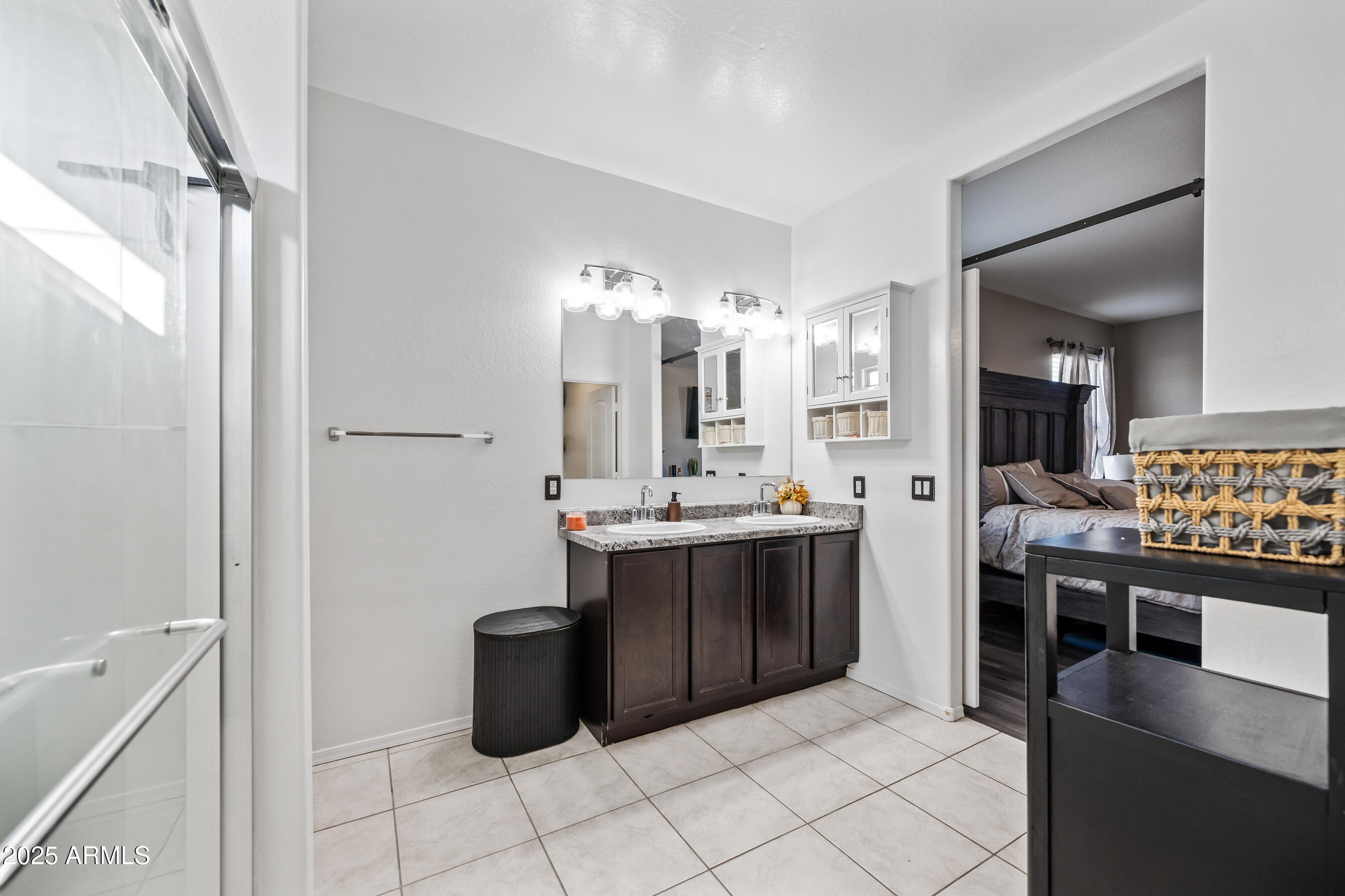 25626 West Coles Road Buckeye, AZ 85326 - Photo 21 of 31 a kitchen with a sink and refrigerator