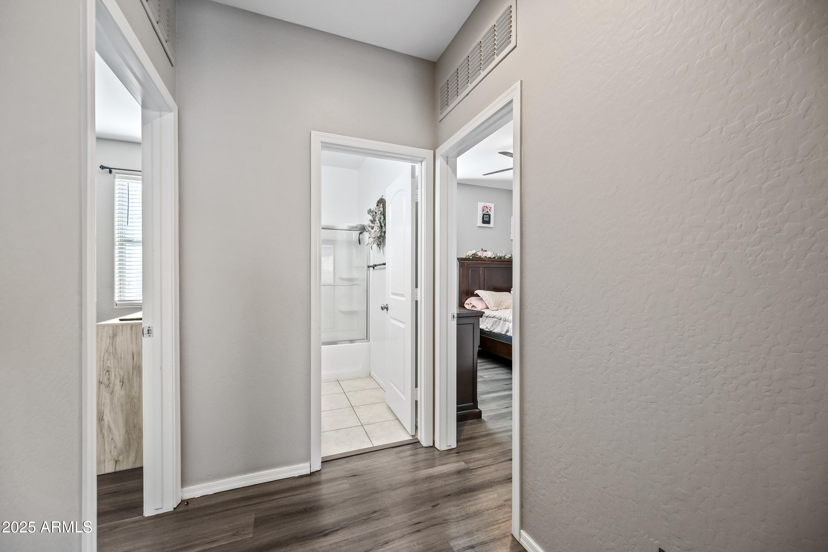 25626 West Coles Road Buckeye, AZ 85326 - Photo 23 of 31 wooden floor in a gallery
