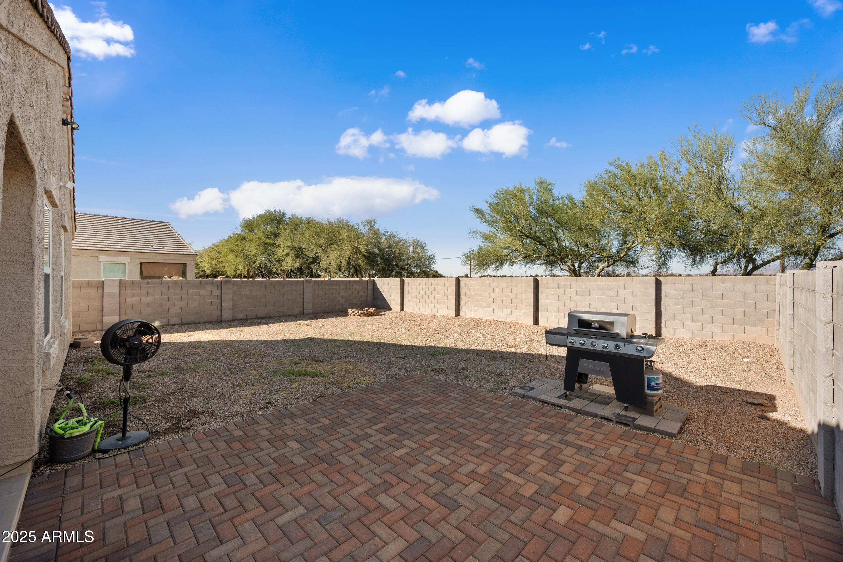 25626 West Coles Road Buckeye, AZ 85326 - Photo 29 of 31 a view of a bench in the patio