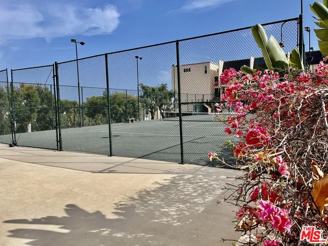 a view of a street with cars