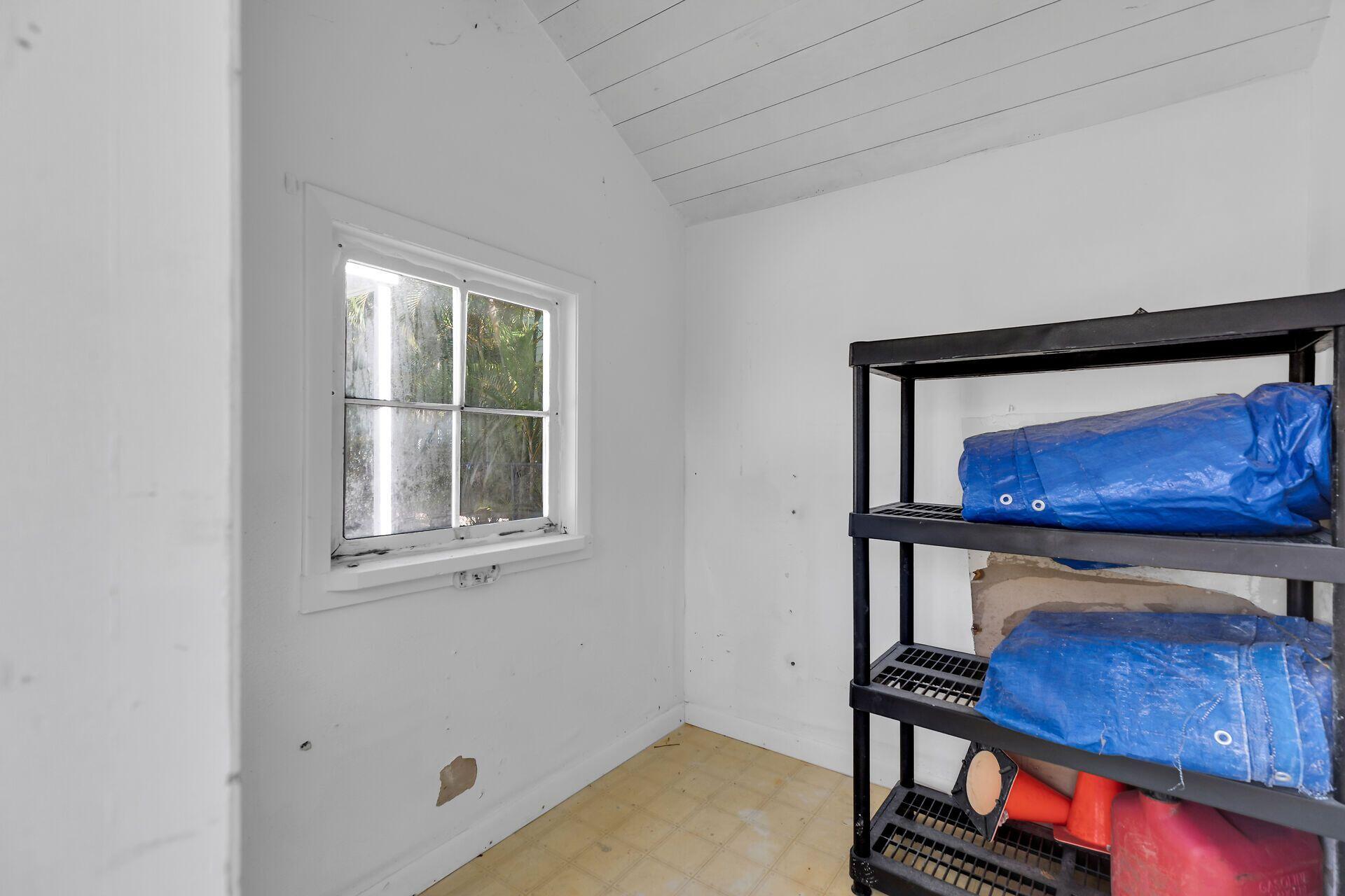 878 La Paloma Road Key Largo, FL 33037 - Photo 31 of 38 a view of an front door