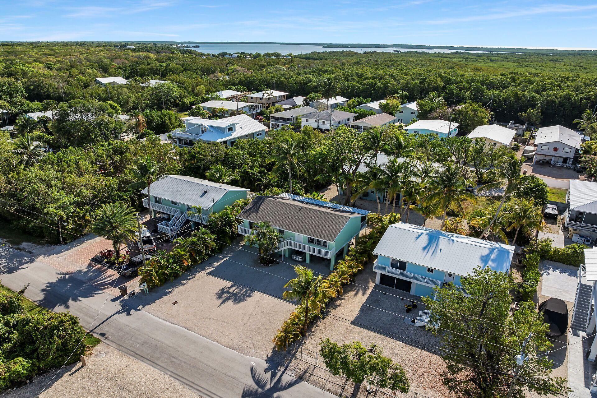 878 La Paloma Road Key Largo, FL 33037 - Photo 36 of 38 an aerial view of multiple house