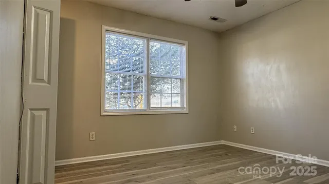 a view of a room that has a window in it