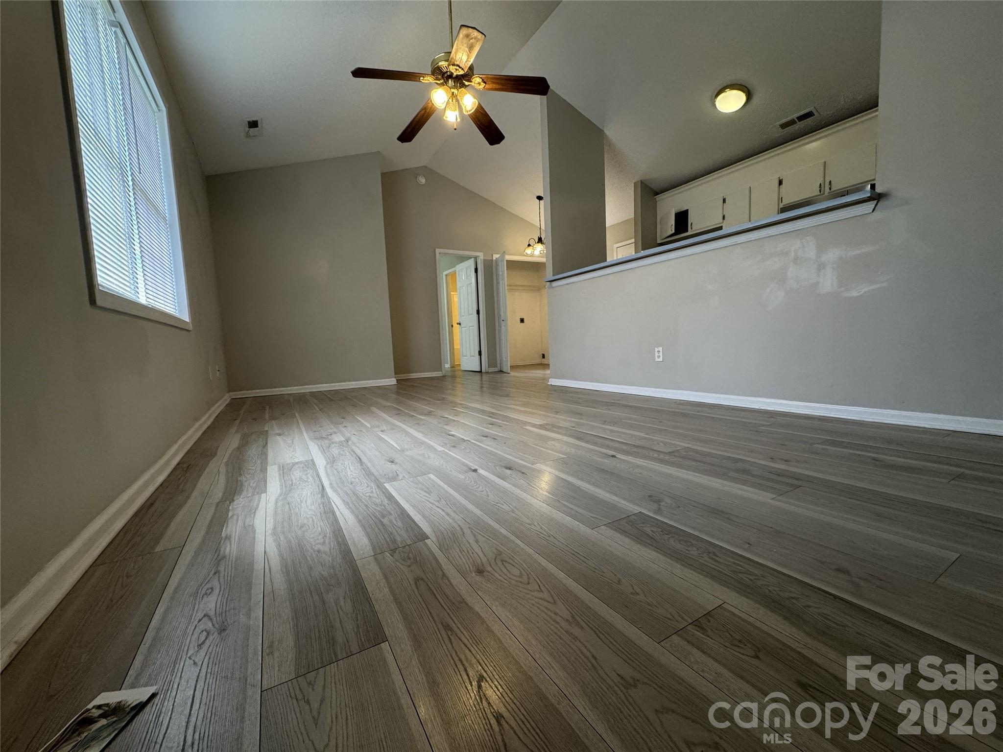 114 South Branch Street Monroe, NC 28112 - Photo 18 of 44 wooden floor in an empty room with a window