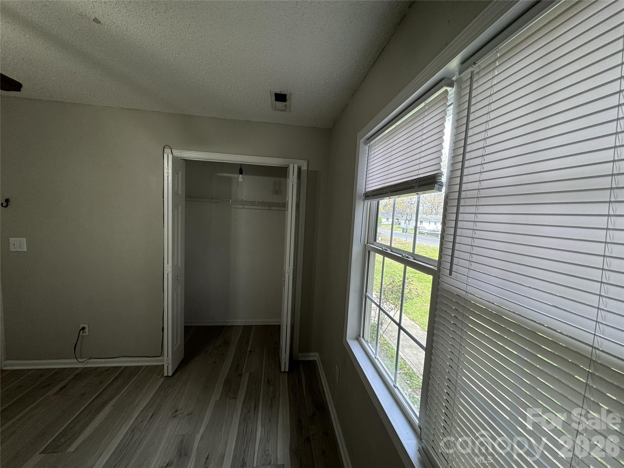 114 South Branch Street Monroe, NC 28112 - Photo 24 of 44 a view of a room with wooden floor and a window