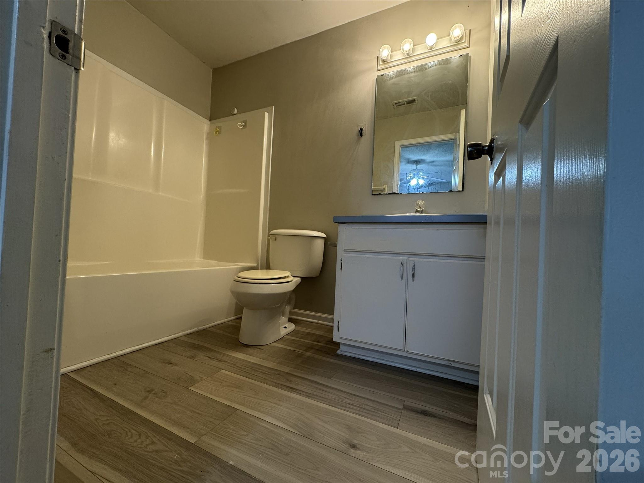 114 South Branch Street Monroe, NC 28112 - Photo 25 of 44 a bathroom with a sink a toilet and shower