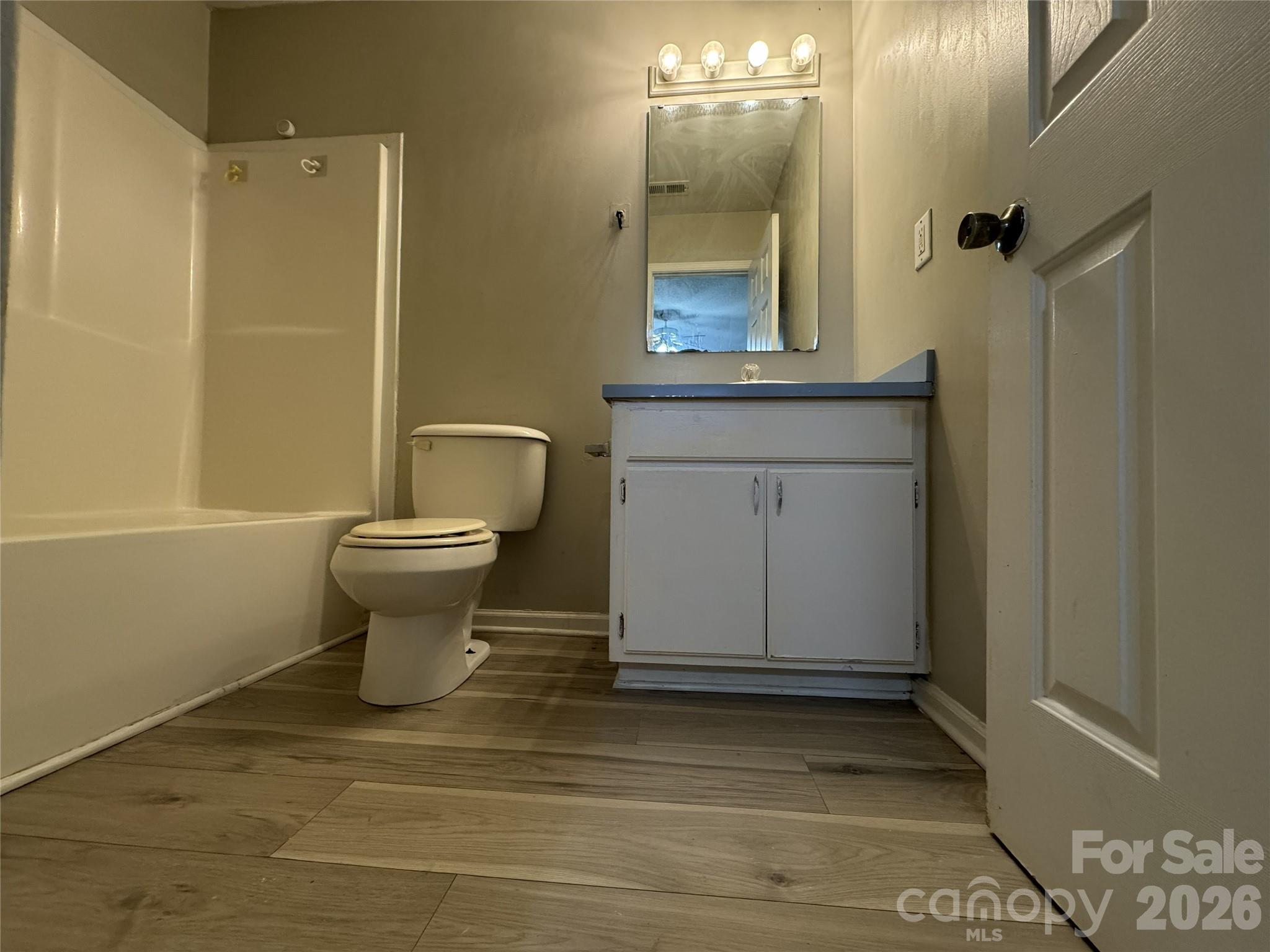 114 South Branch Street Monroe, NC 28112 - Photo 26 of 44 a bathroom with a sink and a mirror