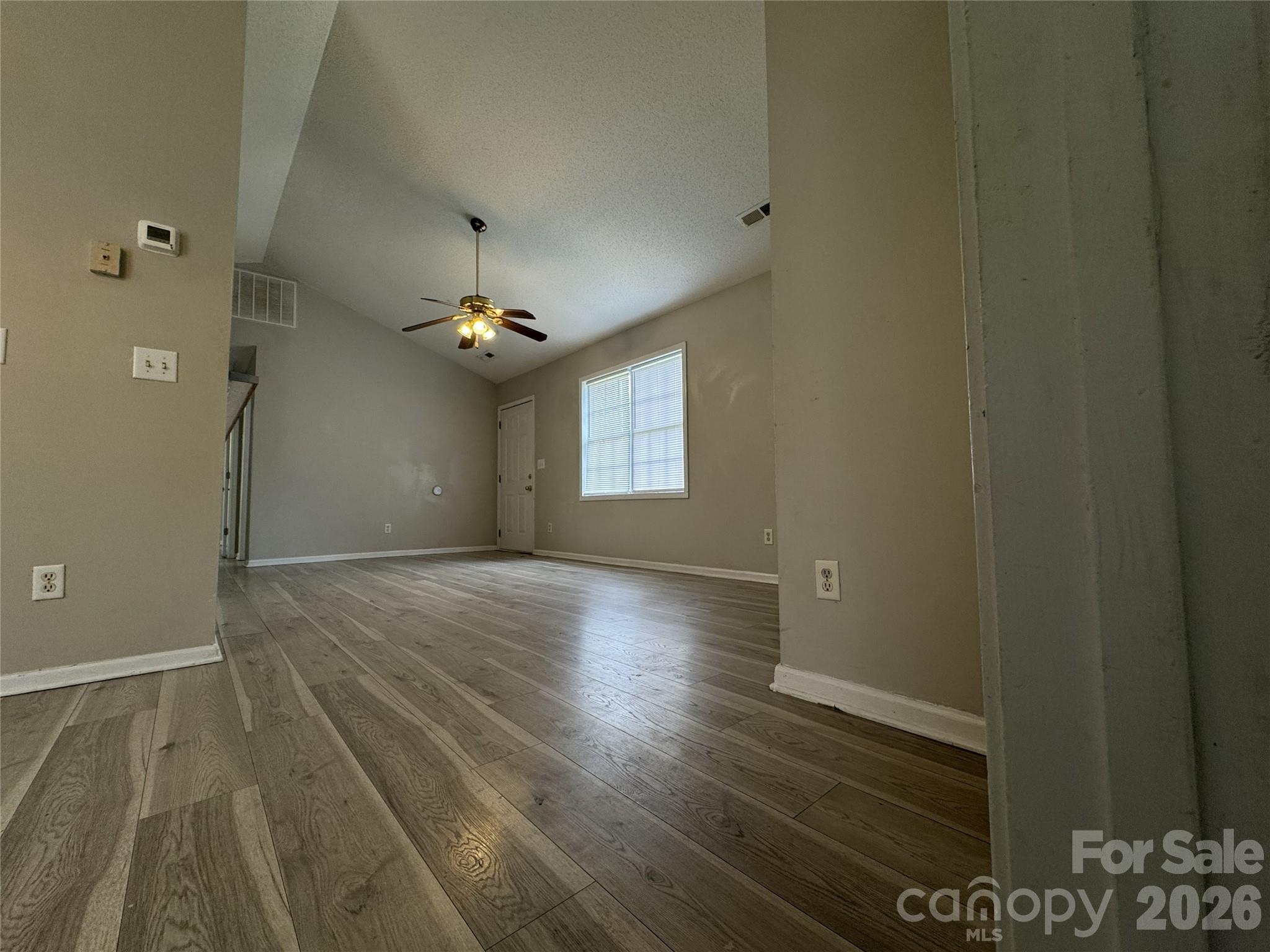 114 South Branch Street Monroe, NC 28112 - Photo 28 of 44 wooden floor in an empty room with a window