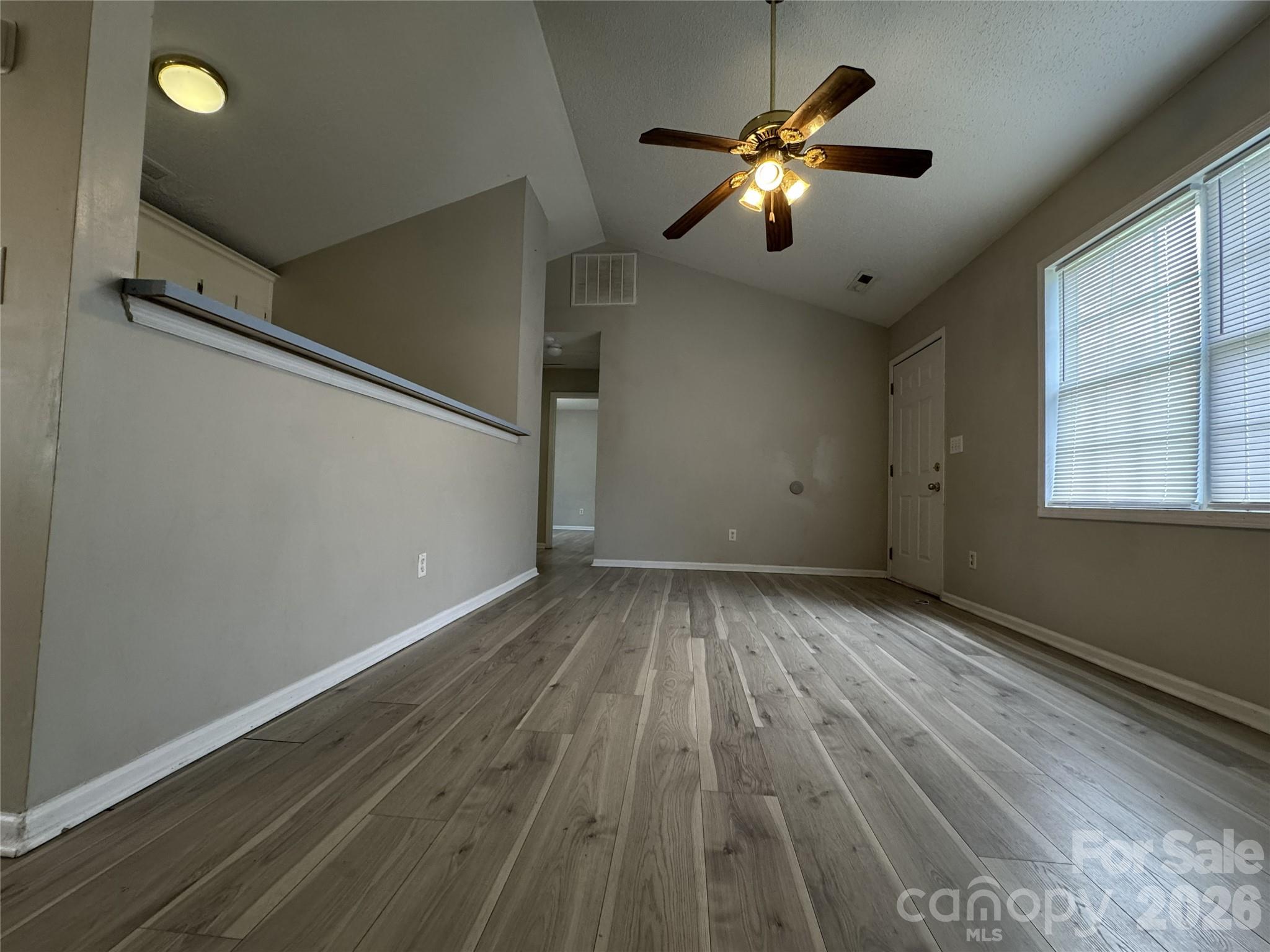 114 South Branch Street Monroe, NC 28112 - Photo 29 of 44 wooden floor in an empty room with a window