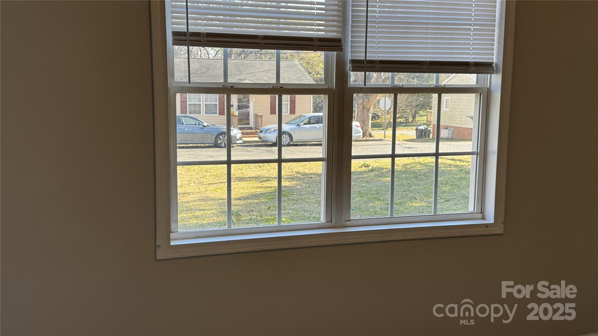 114 South Branch Street Monroe, NC 28112 - Photo 31 of 32 a view of a livingroom with an empty space and balcony