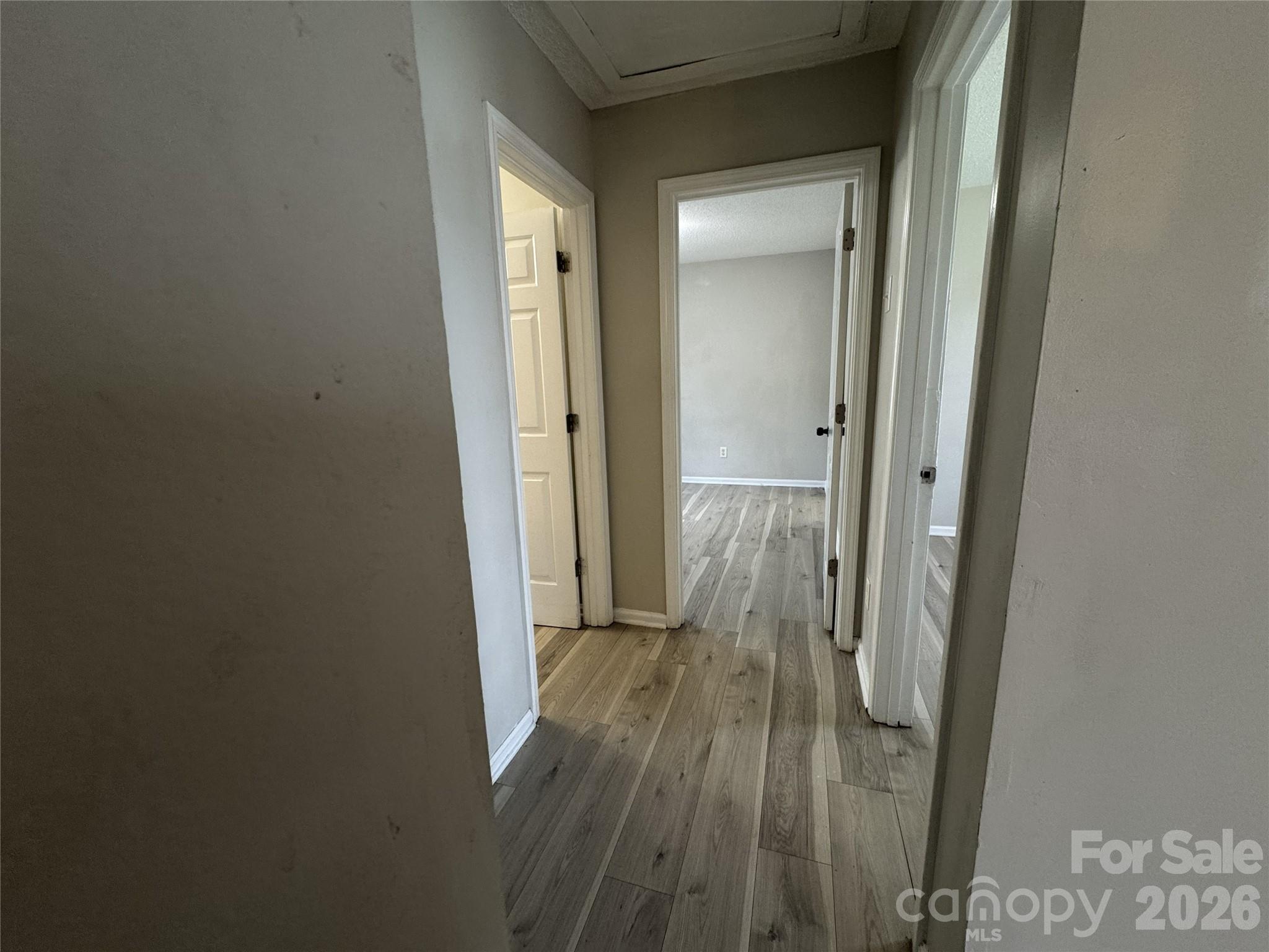 114 South Branch Street Monroe, NC 28112 - Photo 31 of 44 a view of a hallway with wooden floor
