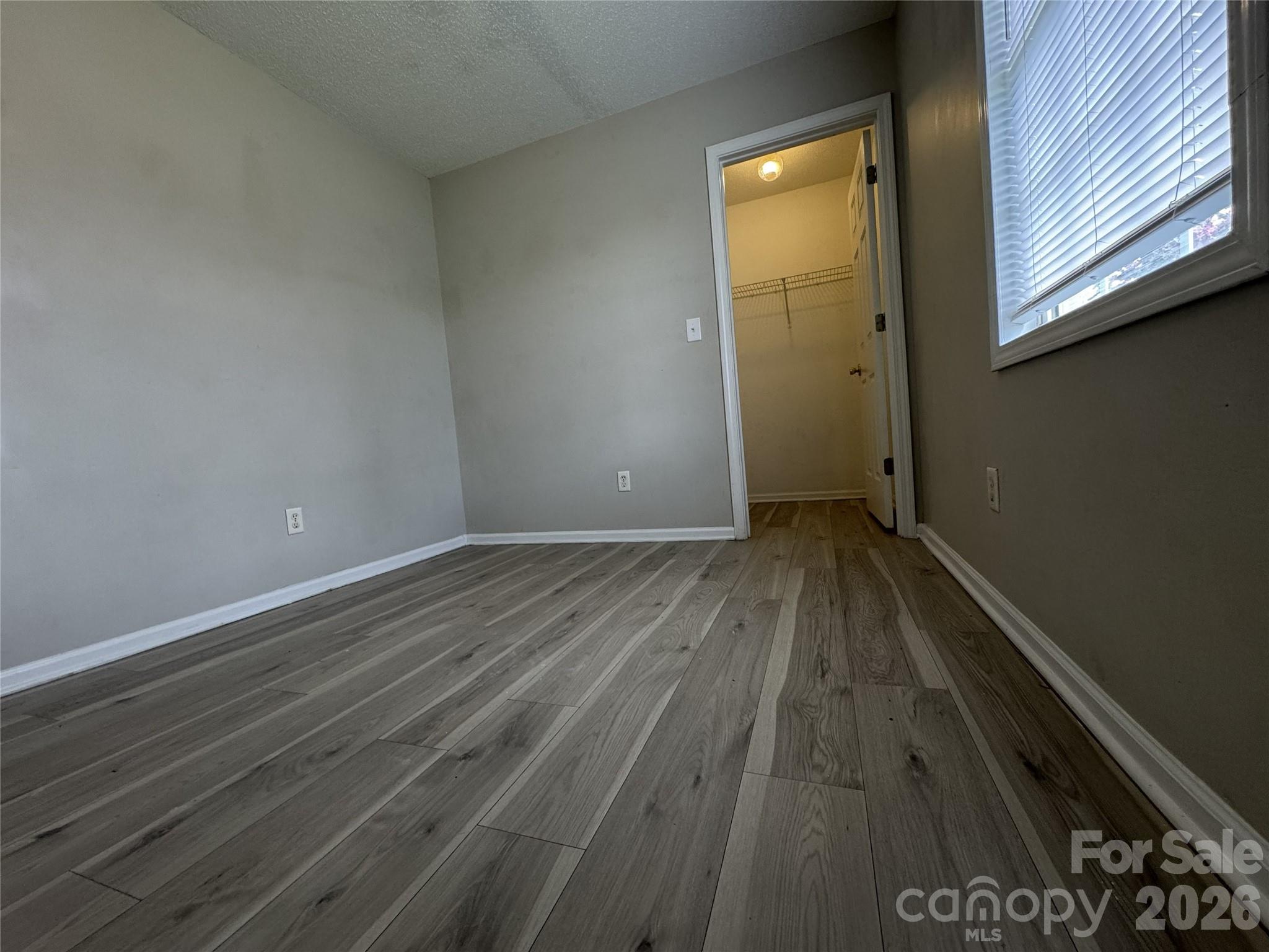 114 South Branch Street Monroe, NC 28112 - Photo 33 of 44 a view of a room with wooden floor and a window