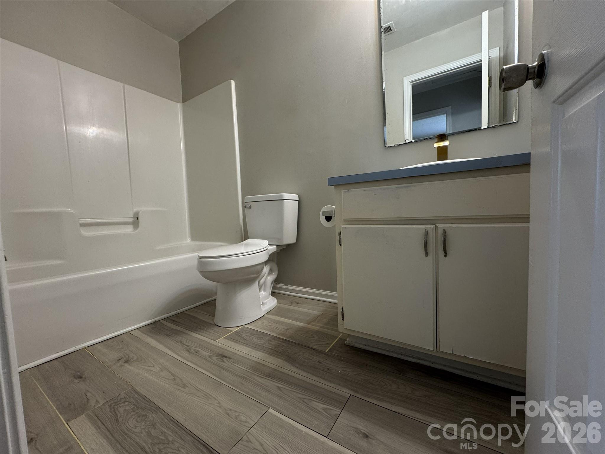 114 South Branch Street Monroe, NC 28112 - Photo 36 of 44 a bathroom with a sink a toilet and shower