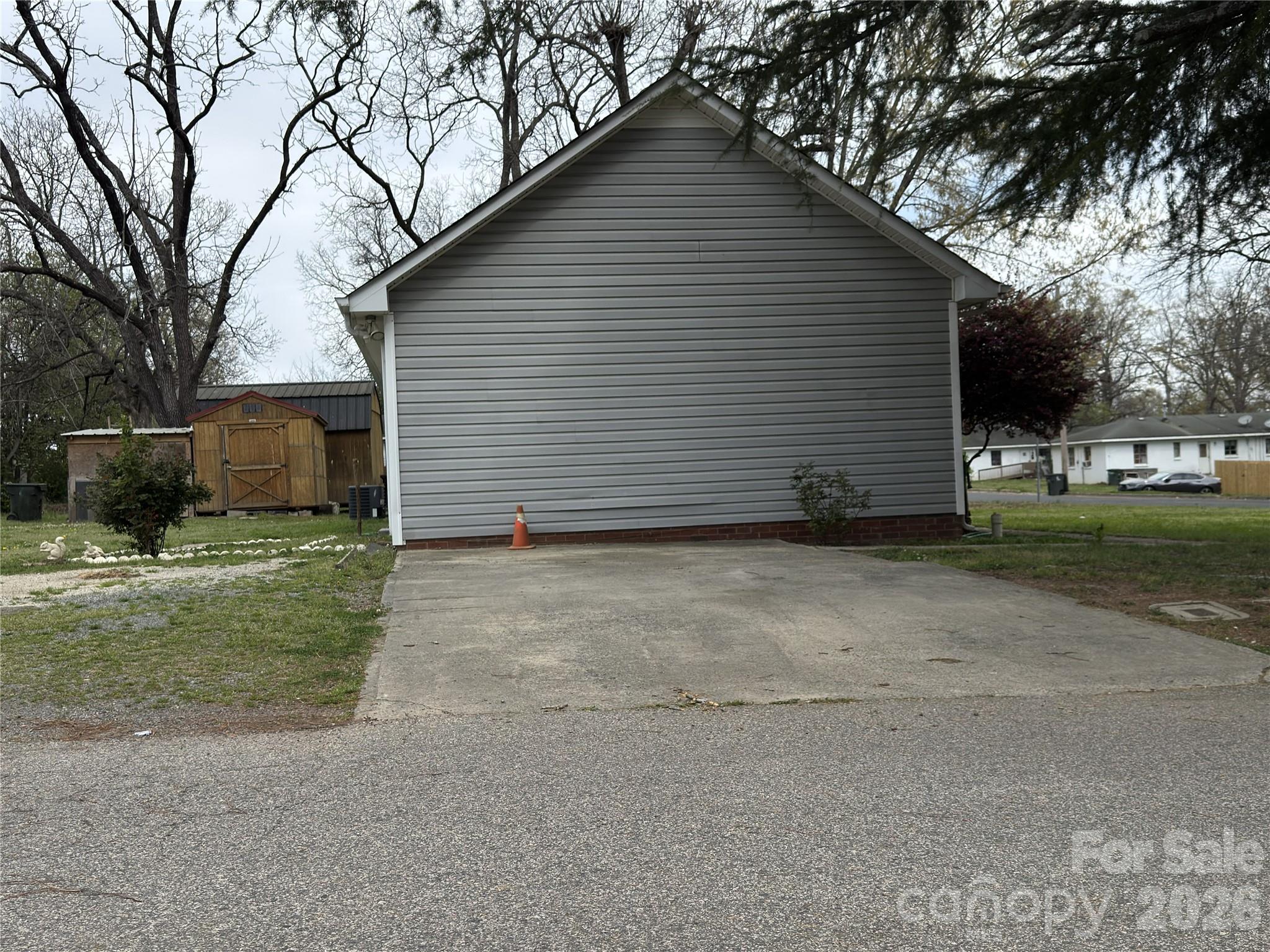 114 South Branch Street Monroe, NC 28112 - Photo 42 of 44 a view of a house with a yard