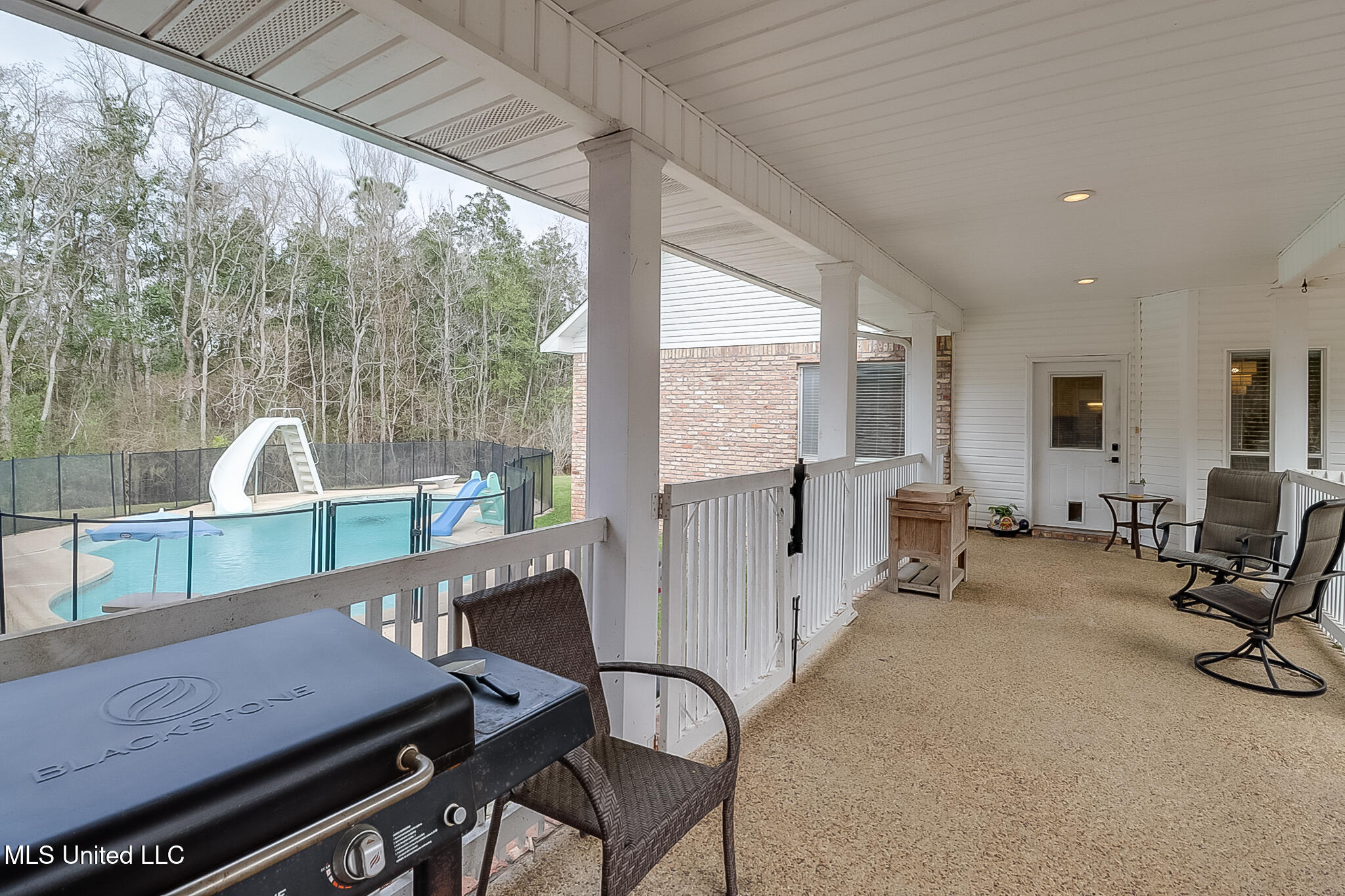 11845 River Estates Circle Biloxi, MS 39532 - Photo 3 of 31 Covered Breezeway/Walkway to Pool