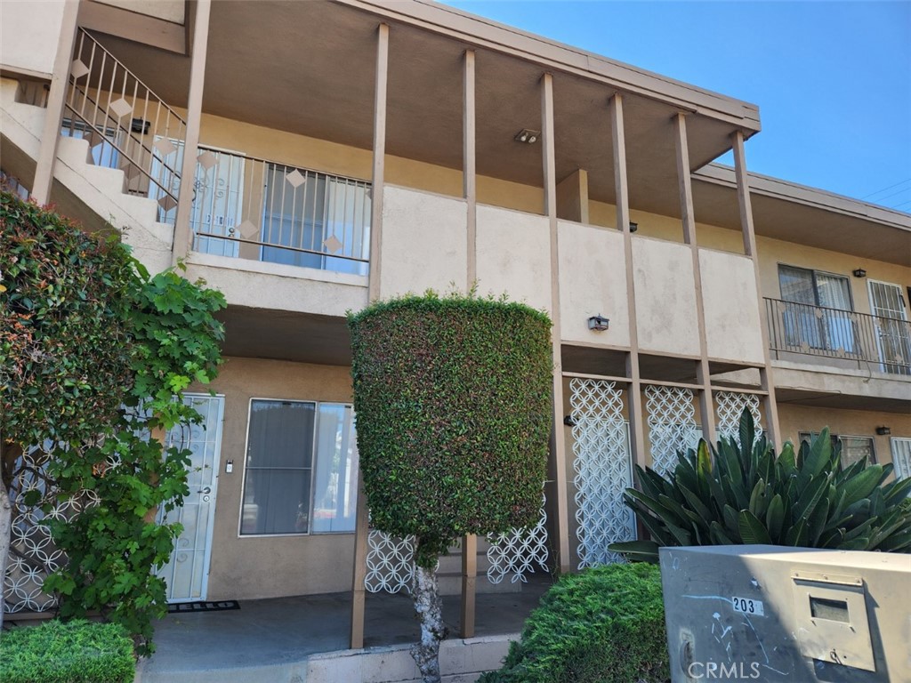 401 West Wilson Avenue, Unit 6 Glendale, CA 91203 - Photo 2 of 12 a front view of a house with garden