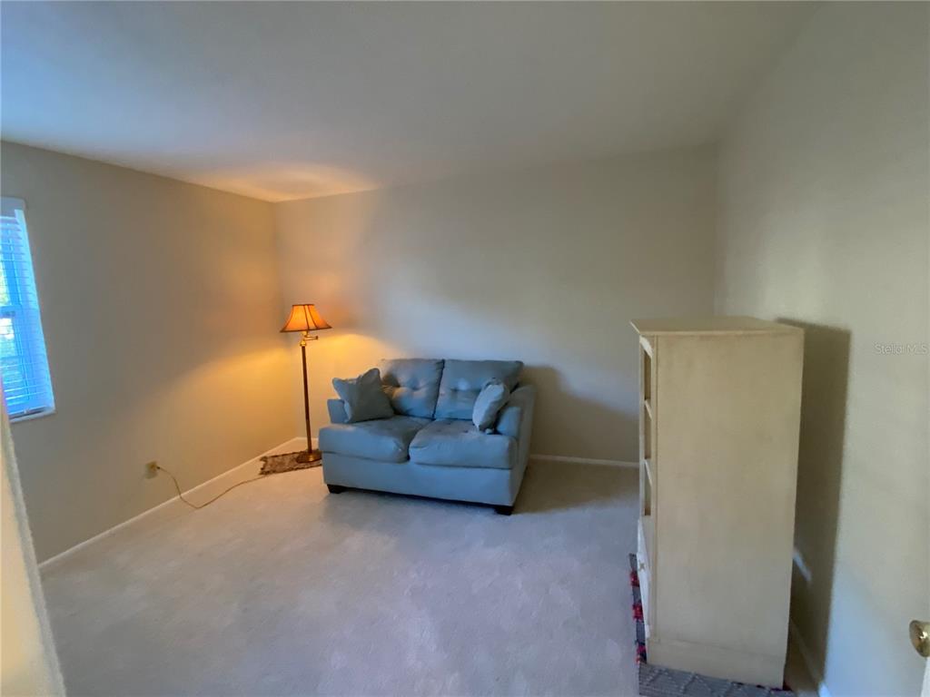 1500 Gay Road, Unit 18A Winter Park, FL 32789 - Photo 13 of 21 a livingroom with furniture and a couch